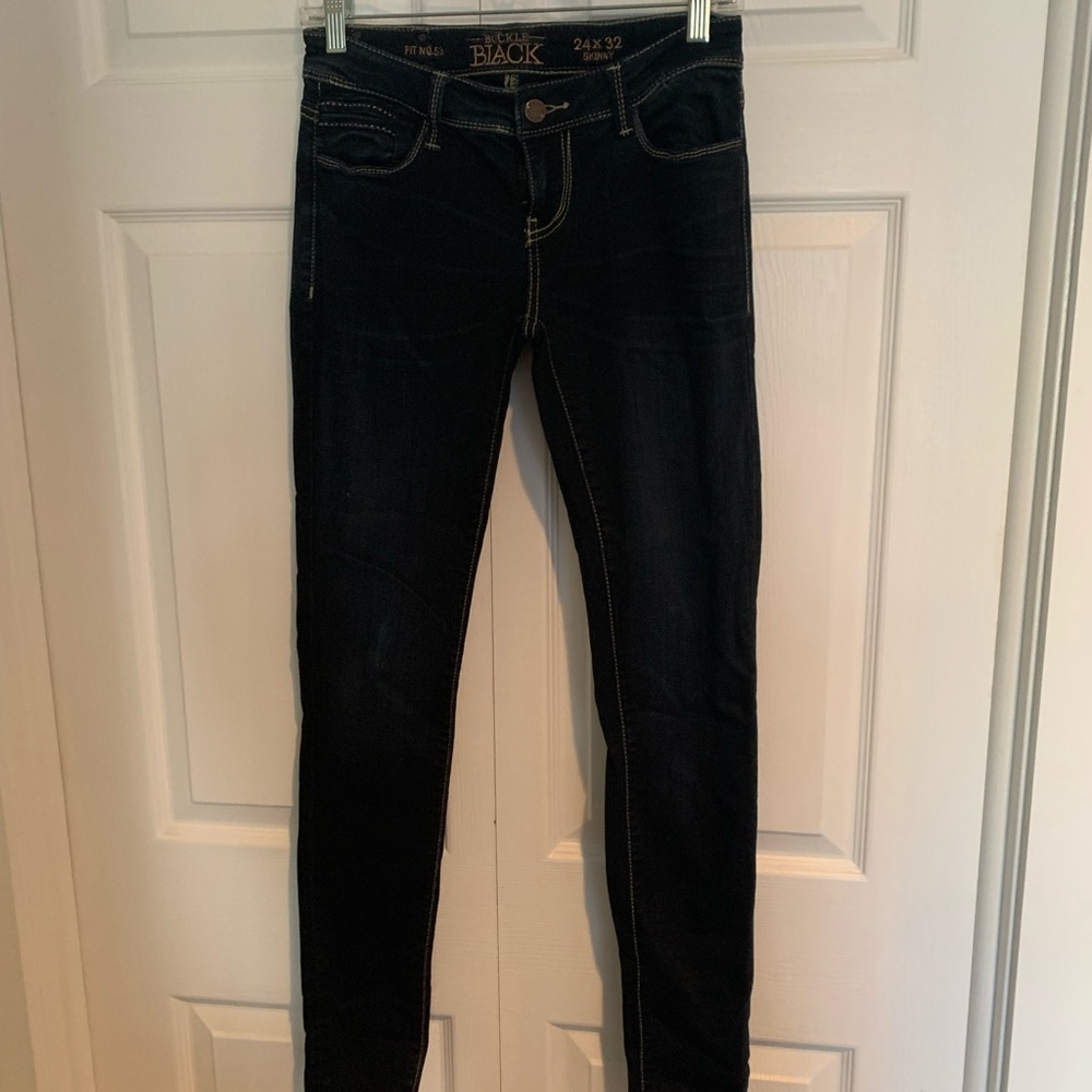 Super dark wash Buckle Black skinny jeans with stretch. EUC. 24x32.